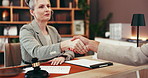 Investor, contract and businesswoman with handshake in meeting for corporate deal, negotiation or agreement. Stakeholders, collaboration and people shaking hands for merger, project approval or offer