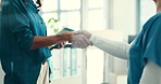 Shaking hands, doctors and agreement with tablet at hospital, deal and welcome with introduction. People, handshake and hiring for medical career with success, achievement and touchscreen at clinic
