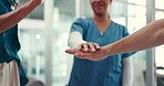 Medical, team and hands together with celebration in hospital for health success, clinic funding and good news. Healthcare, people and stack gesture in office for medicine excellence and solidarity