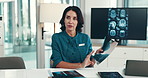 Doctor, woman and meeting with x ray for neuroscience, discussion and problem solving at hospital. Person, surgeon and monitor with mri results, review and talk with brain scan for medical research