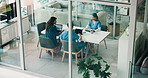 Doctors, meeting and discussion in boardroom at clinic, above and review with laptop, report and feedback. People, surgeon and nurse in team for planning with medical research in office at hospital