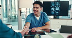 Doctor, man and handshake at interview with resume for promotion, deal or hiring at neurology hospital. Person, surgeon and shaking hands with cv, proposal or medical research paper at brain clinic