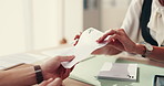 Doctor, hands and patient with prescription for medical diagnosis, instructions or dosage at hospital. Closeup, healthcare worker or client with sick note, clinic form or document of symptoms on desk