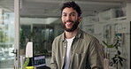 Confident, face and man with smile, office and creative for career growth in web design and laptop. Business, employee and person in agency for visual identity, graphic designer and proud in Canada