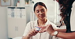 Woman, checkup and patient with doctor for oximeter reading or oxygen measurement at hospital. Female person, client or medical worker checking pulse on finger tip for health examination at clinic