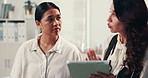 Woman, patient and doctor with tablet for consultation, checkup or diagnosis at hospital. Female person, client and medical worker explaining prescription with technology for symptoms at clinic