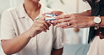 Person, hands and patient with doctor for oximeter reading or oxygen measurement at hospital. Closeup, client or medical worker checking pulse on finger tip for health examination or test at clinic
