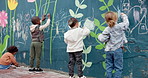 Board, writing and children with chalk at school for creativity, art or learning together. Education, students and back of kids drawing on wall for development, growth or inspiration at kindergarten.
