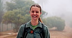 Face, hiking and happy woman outdoor for adventure, travel and holiday with fog. Smile, portrait and person with trekking pole in nature for trip, vacation and explore forest on journey in Germany