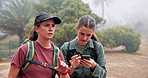 Hiking, mountain and women with phone for direction, navigation and location on digital map. Friends, nature and people on smartphone for online guide on adventure, journey and exercise for signal