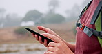 Hiking, hands and woman with phone in nature for direction, navigation and location online. Mountain, typing and person on smartphone for social media on adventure, journey and travel outdoors