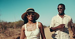 Couple, happy and outdoor on safari, vacation and face in nature, road and excited at national park in summer. Woman, man and smile with sunglasses, holiday and together at game reserve in Kenya