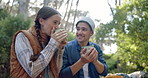 Relax, hiking and couple in woods with coffee, smile or bonding on outdoor adventure holiday together. Drink, man and woman in forest for rest on morning trekking, travel vacation or happy in nature