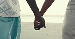 Beach, holding hands and couple with love, travel and vacation with relationship. Closeup, people and man with woman, seaside and ocean for honeymoon, marriage and romance with summer holiday or care