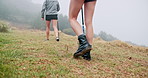 Trekking stick, legs and friends walking back outdoor for travel, adventure and journey with fog on mountain. Trip, hiking pole and shoes of women in nature for vacation, balance and exploration