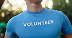 Person, volunteer or nature with community service for earth day or eco friendly environment. Closeup, social worker or activist with pride or development for climate change, charity or NGO in forest