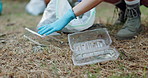 Person, hands and bag with plastic for recycling, waste management or earth day in nature. Closeup, volunteer or social worker cleaning dirt for NGO, community service or eco friendly environment