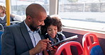Tablet, commute and businessman on bus for child, morning travel and online games for journey. Digital technology, public transport and passenger on app for class schedule, entertainment or learning