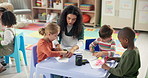 Woman, teacher and helping children with drawing in kindergarten classroom for early childhood development. Female person, educator or instructor with kids for fun activity or coloring at school