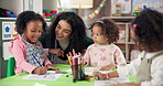 Woman, teacher and helping kids with drawing in kindergarten classroom for early childhood development. Female person, educator or instructor with children for youth, activity or coloring at school