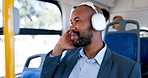 Man, headphones and smile with music in bus for travel, audio streaming or commute in city. Business person, sound and fun with energy in vehicle for public transportation or tourism in urban town