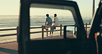 Friends, road trip and men talking by beach for bonding, conversation and communication. Relax, nature and people with car for hangout, chill and chatting on holiday, vacation and weekend outdoors