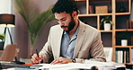 Documents, laptop and businessman write for research, information or report on company budget. Computer, paperwork and male financial manager with investment planning for corporate dividend.