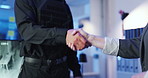 Shaking hands, security and monitor for surveillance at office with agreement, deal or welcome to company. People, safety professional and handshake for thanks, respect or achievement at data center