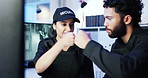 Fist bump, people and security team for surveillance success, cctv and goal for protection. Safety, guard and hand gesture for celebration, smile and support with friends in control room at night