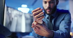 Hands, wrist pain and computer with screen in office for surveillance, stress and fatigue for security company. Person, sore joint and monitor with arthritis, carpal tunnel or injury at data center