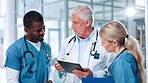 Nurses, mentor or doctors in clinic with tablet, planning or health treatment results in group. Meeting, teamwork or people in discussion for medical advice, hospital schedule or diagnosis research