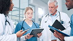 Surgeon, planning and doctors in group with tablet for talking, health treatment results or clinic. Clipboard, teamwork and people in discussion for medical advice, schedule and hospital research
