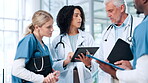 Healthcare, planning and doctors in group with tablet for talking, virus treatment results or clinic. Clipboard, teamwork and people in discussion for medical advice, schedule and hospital research