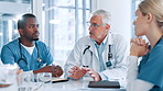 Meeting, healthcare or doctors in hospital with nurses, planning or health treatment results in group. Mature mentor, teamwork or people in discussion for medical advice, clinic schedule or research