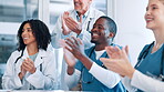 People, doctors and applause for team support, celebrate and praise with pride from professional medical group. Healthcare, seminar or workshop with clapping hands for cheers, success and motivation