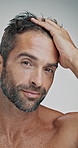 Man, hair care and happy with face in studio for grooming, results or confident by background. Mature person, model and shirtless for pride, wellness or routine with change for hairstyle in Argentina