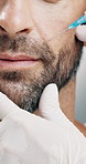 Injection, collagen and mouth with man and hand for dermal filler, anti aging and facelift treatment. Dermatology, cosmetic procedure and beauty with closeup of person for wrinkles and smile line