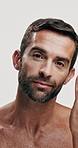 Beauty, face and  skincare with man in studio for dermatology, anti aging and self care. Spa treatment, cosmetics and inspection with mature person on white background for grooming and facial
