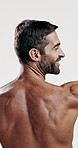 Fitness, muscle and back of man in studio for sports athlete, workout and flexing progress. Body care, strong and bodybuilder with person on white background for training, exercise and wellness