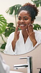 Cosmetics, woman or check face in mirror for skincare treatment results, natural beauty or collagen benefits. Reflection, african person or happy with morning routine inspection for skin glow in home