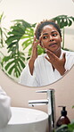 Beauty, woman or check face in mirror for hydration treatment results, natural glow or collagen benefits. Reflection, african person or happy with skin inspection for self care or dermatology in home