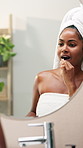 Girl, brushing teeth and dance by mirror, home and silly for cleaning mouth with hygiene in bathroom. African woman, bamboo toothbrush and happy for sustainability, oral health and playful at house
