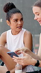 Social media, phone and friends on tennis court for discussion, break or competition. Talk, bonding and women with athlete, smile and happy for exercise, wellness and training or workout practice