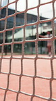 People, net and ball with paddle for sport match, game or physical exercise together on outdoor court. Athlete, team or tennis players with obstacle for fitness, training or competition on pitch