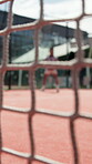 Net, serve and fitness with person on tennis court for competition, challenge and training match. Wellness, workout and health with athlete in sports club for energy, exercise and tournament practice