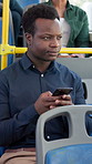 Phone, thinking and travel with black man on bus for public transportation to city destination. App, social media and text message with passenger person in vehicle for commute, journey or trip