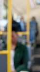 Bus, blurry and people with travel in city for sightseeing on holiday, vacation or weekend trip. Travel, destination and commuters on public transport service for location with journey in town.