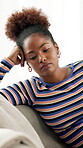 Bored, thinking and woman in lounge, home and student with  lack of motivation for education and lonely. Mental health, reflection and black person with depression, living room or thoughtful in house