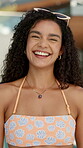 Face, smile and woman with fashion at resort for summer holiday, getaway trip and sunglasses. Portrait, happy and person laughing for funny joke, stylish swimwear and vacation travel at luxury hotel