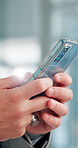 Hands, phone and businessman in office typing for email, communication or contact online. Technology, closeup and male attorney texting client on mobile app for legal report, proposal or case.